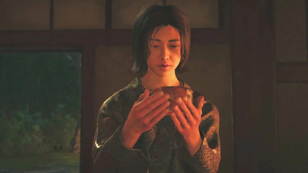 Assassin's Creed Shadows Otama Wakasa choice - Naoe holding a bowl of tea up to her face, ready to drink.