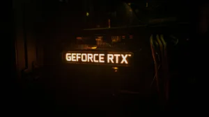 GeForce RTX backlighting on a graphics card lighting up in a dark room