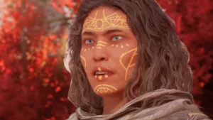 Un personaggio femminile di Solasta II con i capelli ricci castani e tatuaggi bianchi sul volto