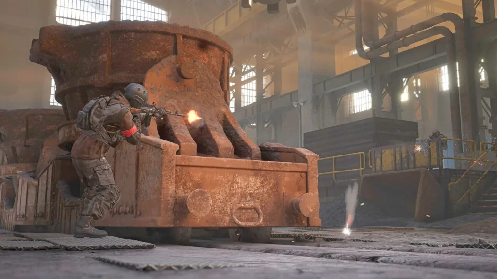 Wardogs si prepara al lancio con un nuovo test gratuito su PC 5 Wardogs playtest: two soldiers mid gunfight inside an industrial building.