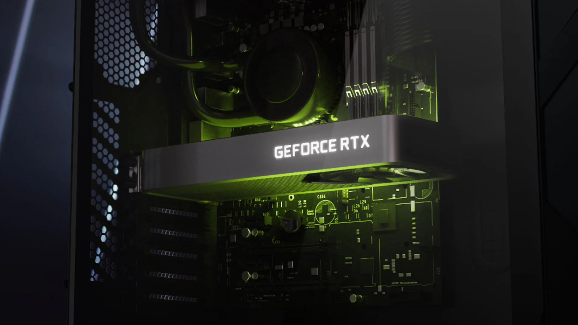 Primo piano di una scheda video GeForce RTX grigio scuro con la scritta retroilluminata dentro un PC