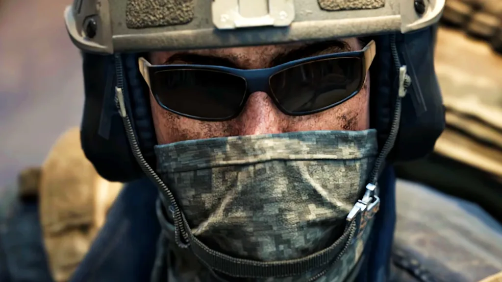 Wardogs Season 1 patch notes include a rebalancing to ensure the top players "need to grind" for the best items - A soldier wearing camo and sunglasses.