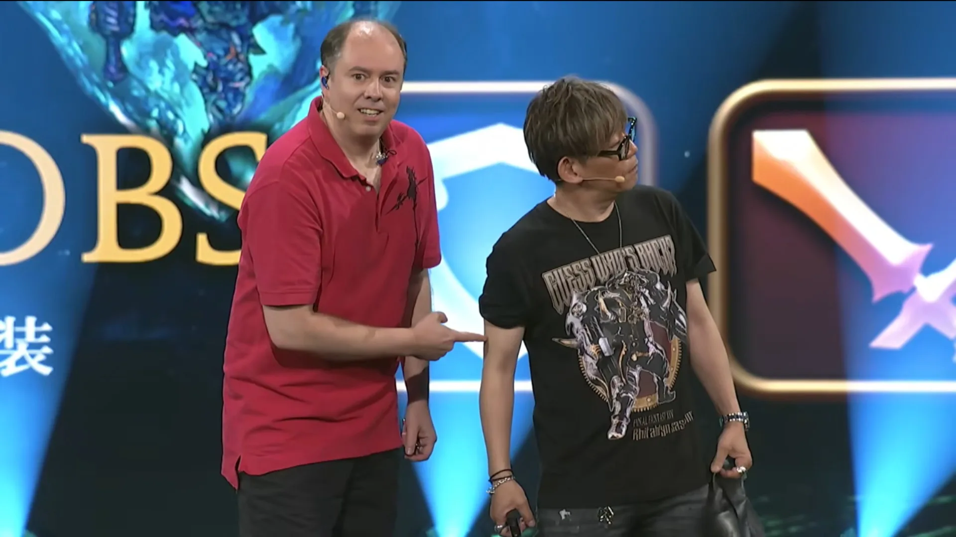FF14 Evercold - game director Naoki Yoshida teases the upcoming classes with a t-shirt of Rhitahtyn sas Arvina that reads, 