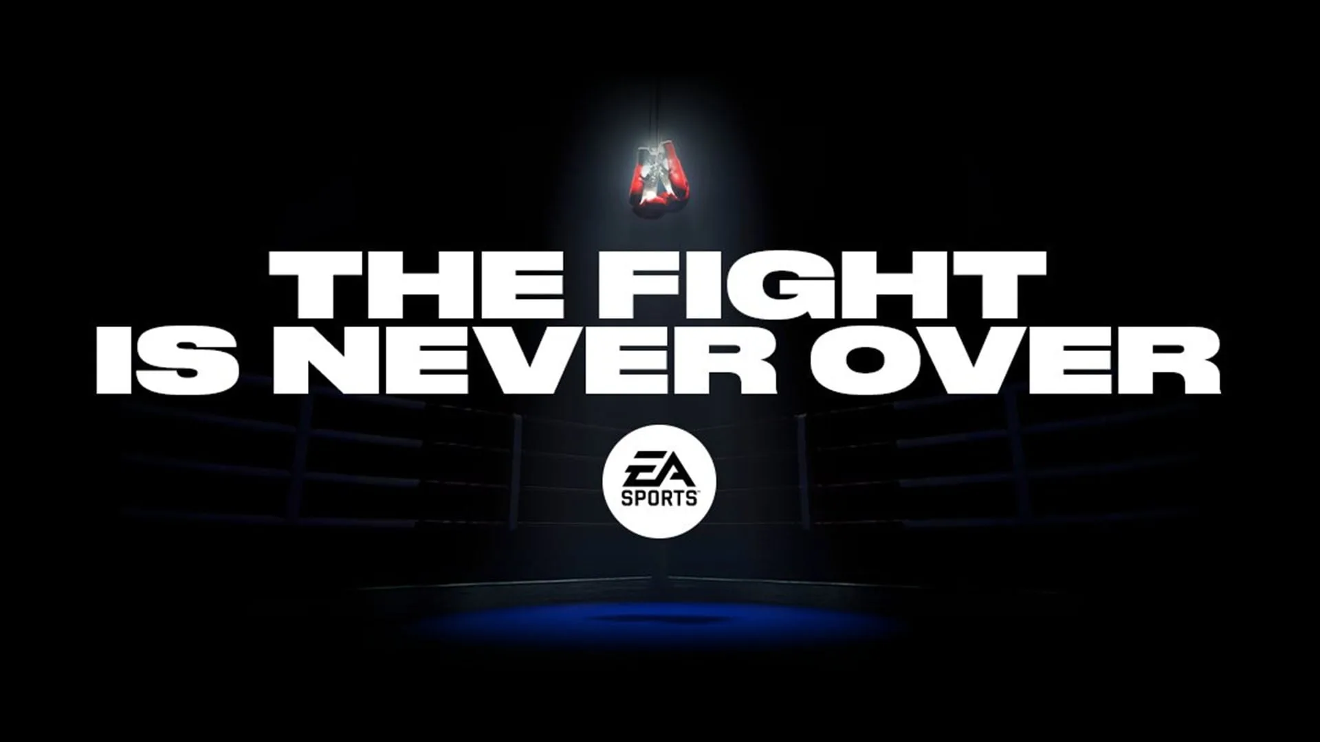 Un paio di guantoni da boxe appesi sopra un ring vuoto nell'immagine con cui EA Sports ha annunciato il ritorno di Fight Night