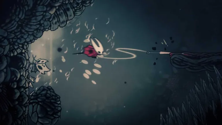 hollow-knight-silksong-sands-of-karak-pcgamesn-5 Hornet che evita un nemico da parete in Silksong.