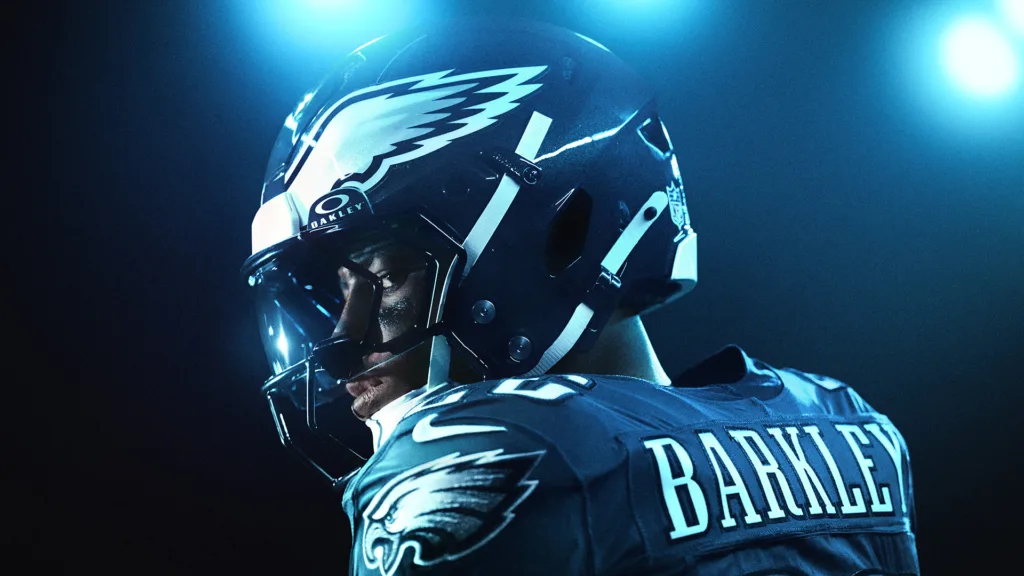 Un giocatore di Madden NFL 26 corre con il pallone durante una partita